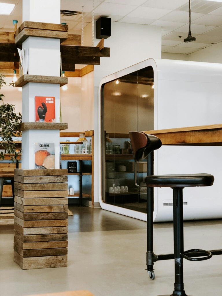 Sleek office space featuring a chair, modern design, and wooden accents.